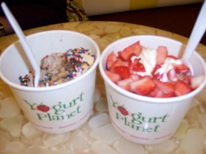 Our frozen yogurt we ate tonight.  Mine is the one on the right (cheescake with strawberries.)