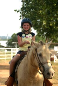 Camper riding horses at the Indian Springs location of CLH